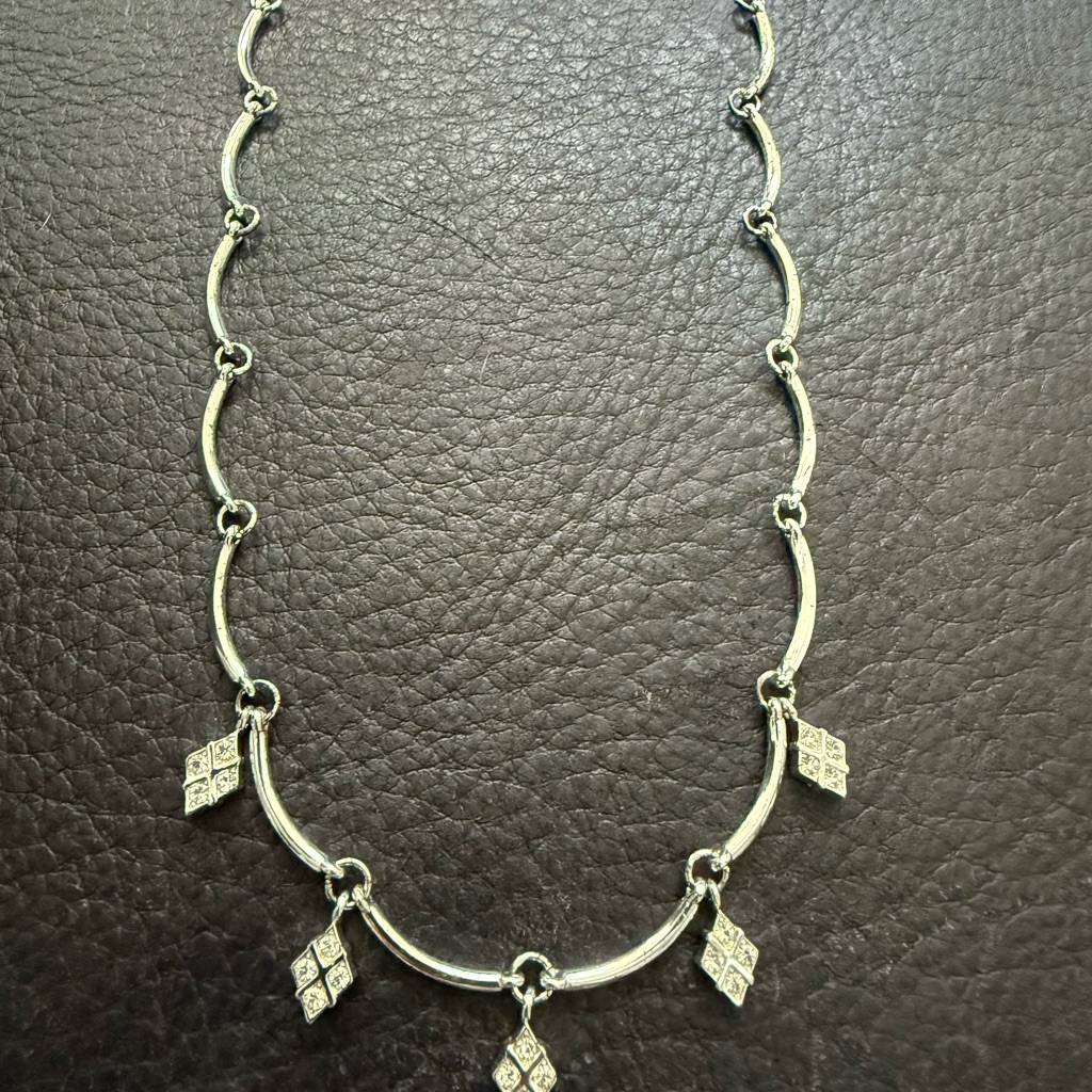Tommy Hilfiger Silver Necklace With Geometric Charms 7$